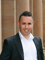 Chris Rousos - Real Estate Agent