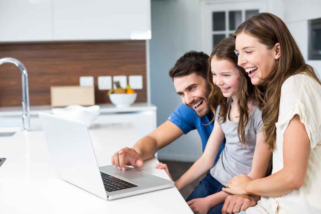 family using computer