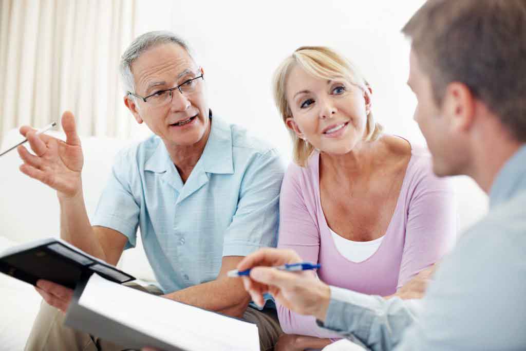 people couple meeting with real estate agent